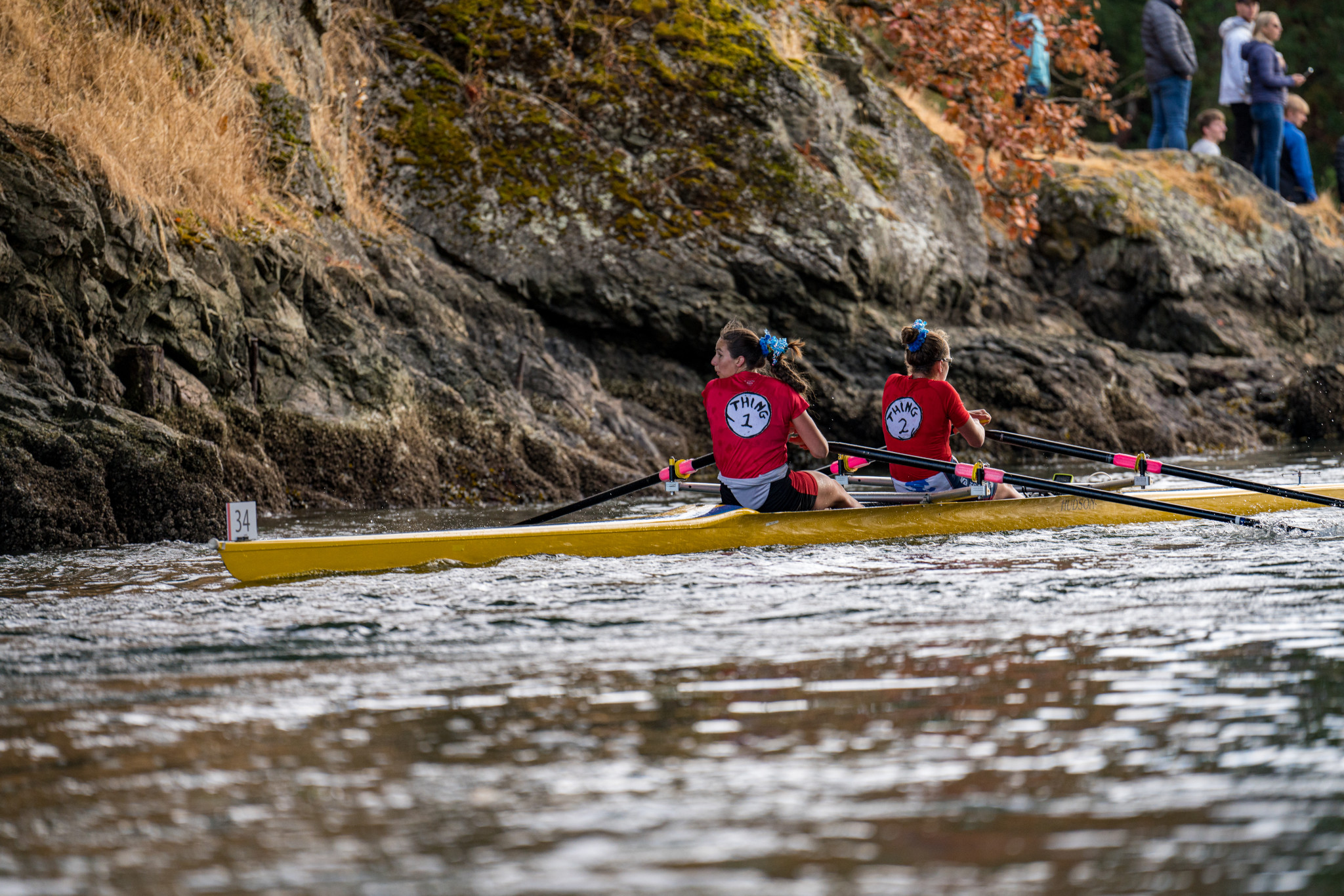 Rowers dressed as Thing1 and Thing2 from Dr. Seuss going through the Tillicum Narrows.
