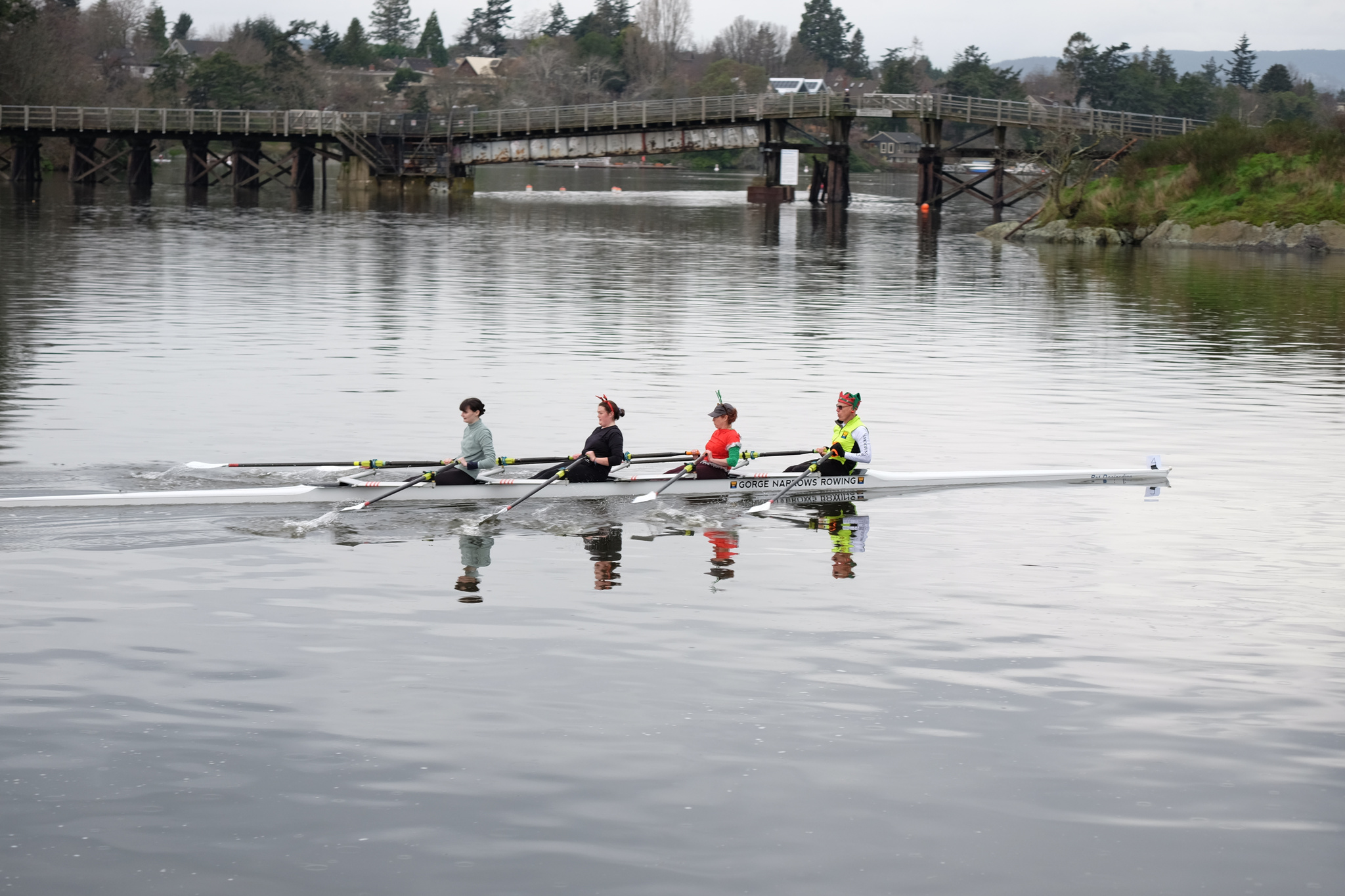 A quad racing. In the background is the Selkirk Trestle.