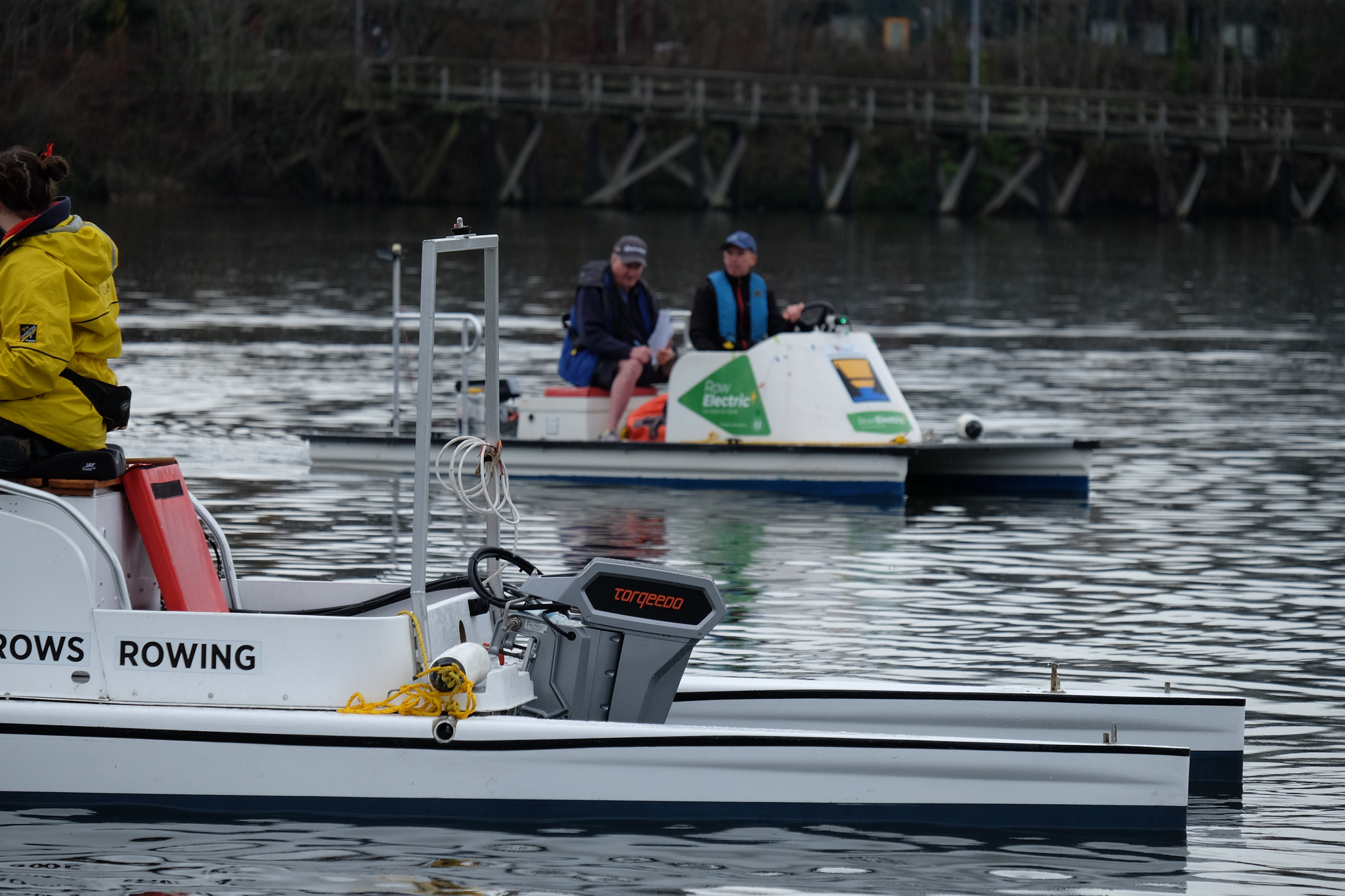 Two coach boats on the water.