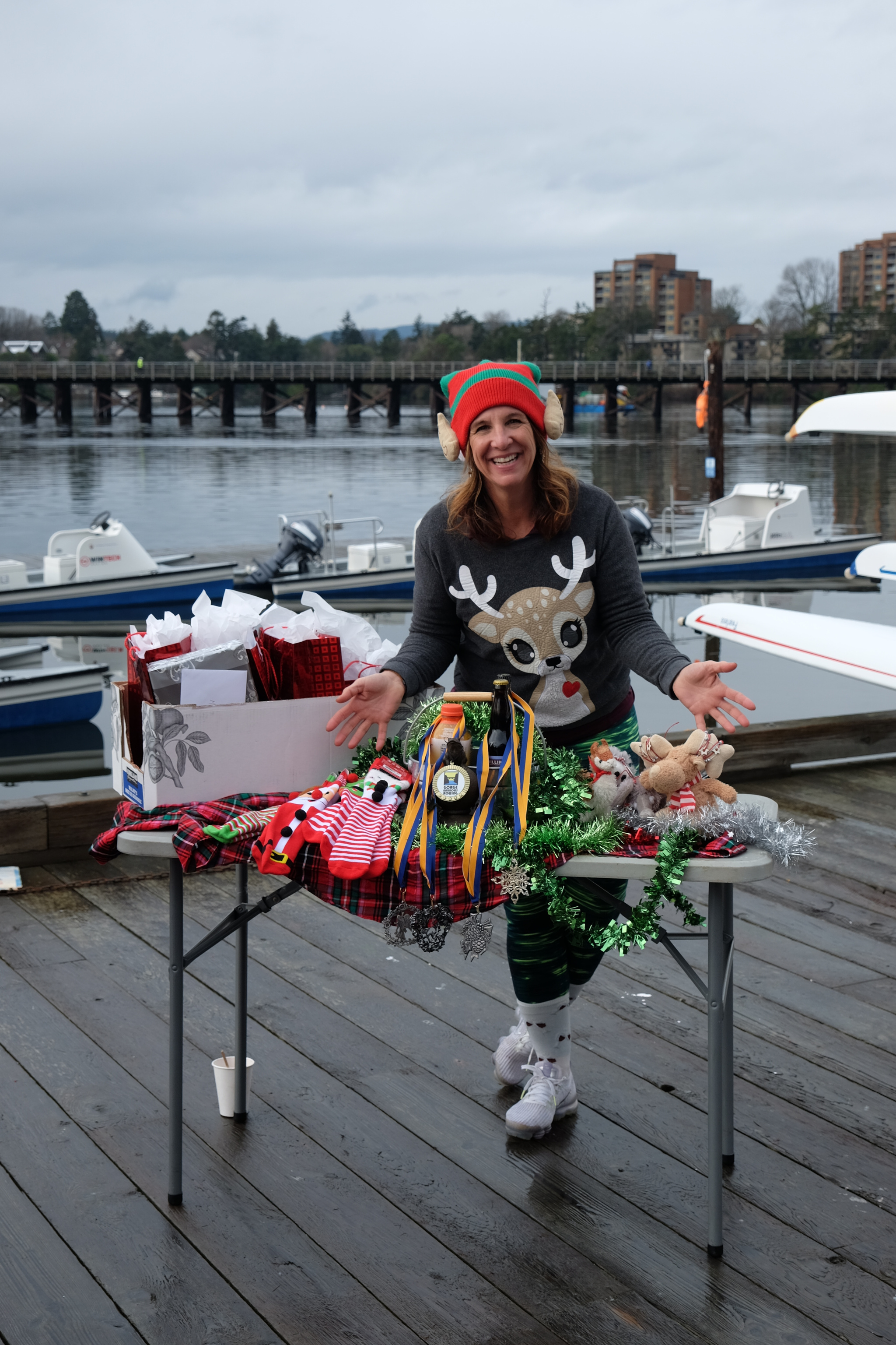 Our club manager, Rachel, presenting the table holding the race prizes.