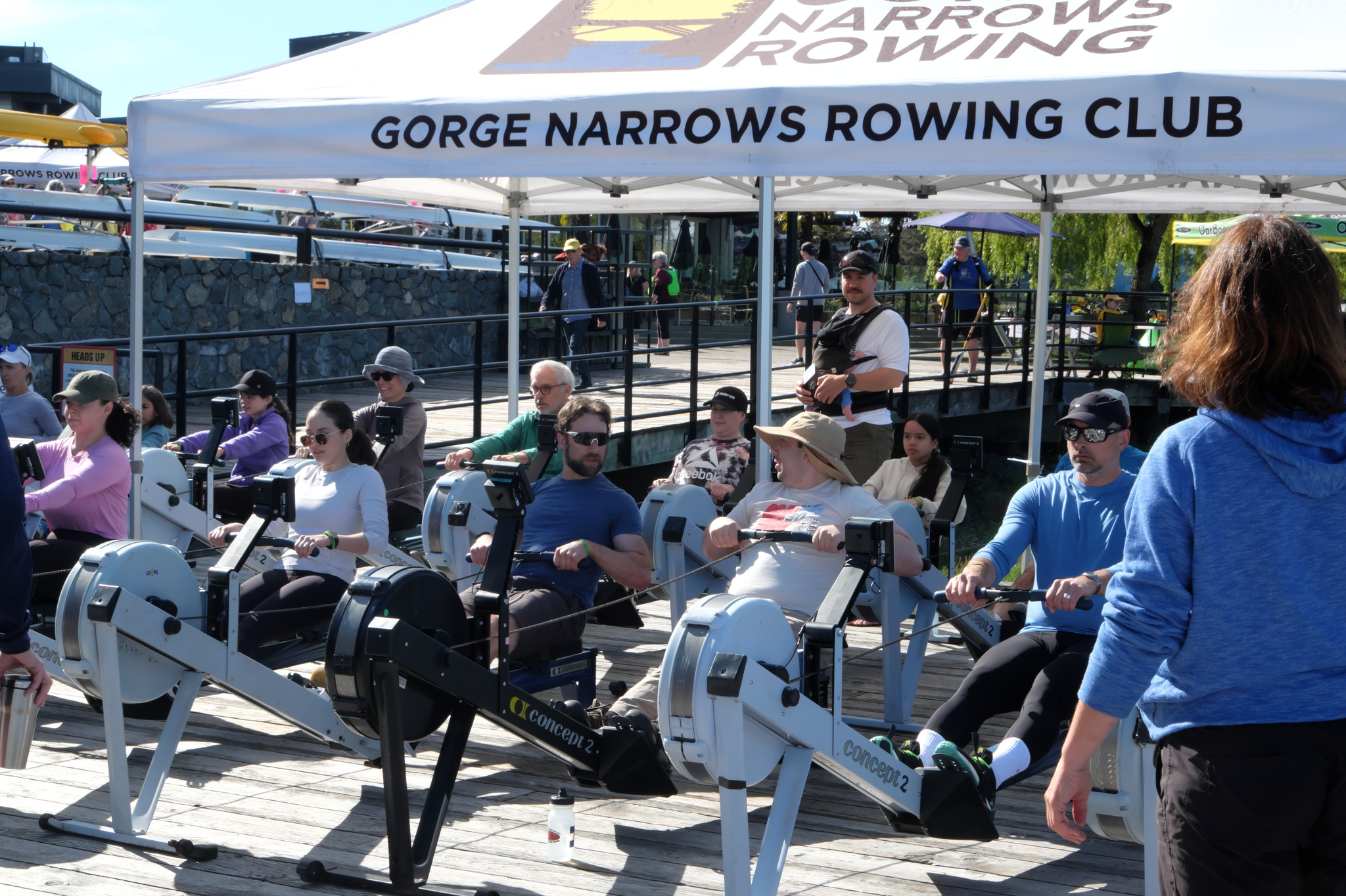 Rowers learning the basics of the stroke with a Concept 2 ERG.