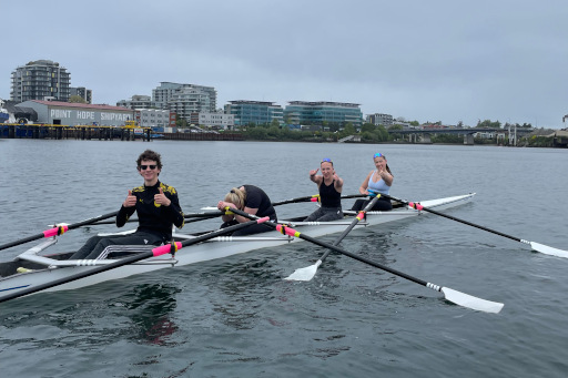 Youth rowers in a quad.