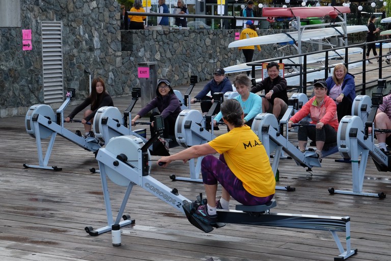 New rowers learning on the ERG, being led by a M.A.S.T. team member.