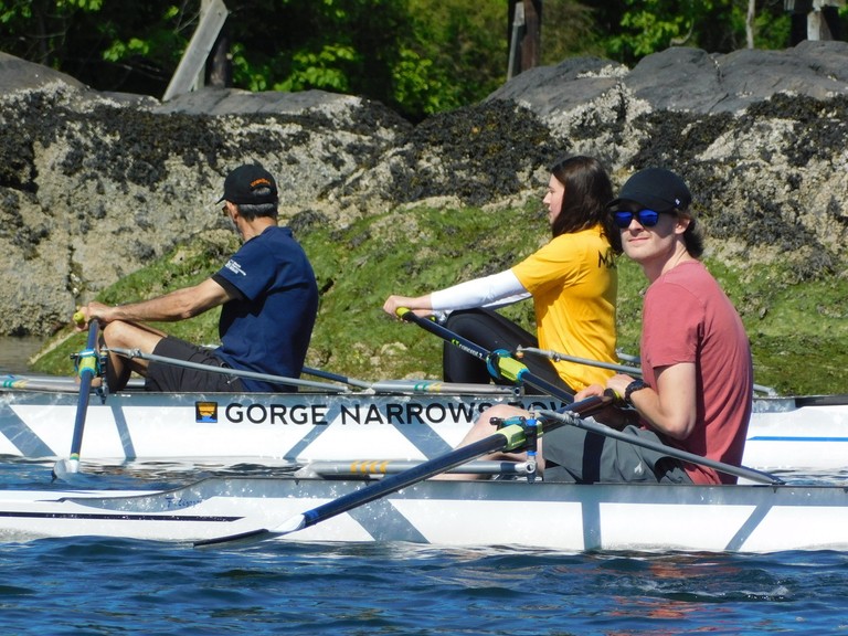 Two quads rowing next to each other.