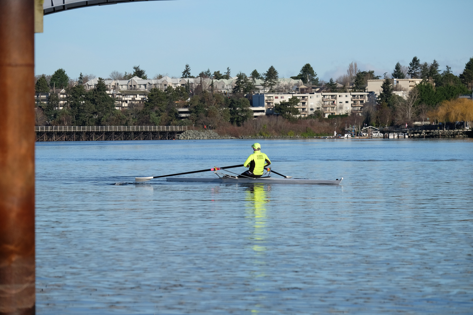 A winter rower in a single.