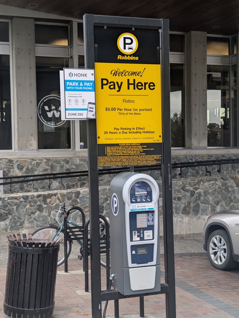 Pay parking next to the club.