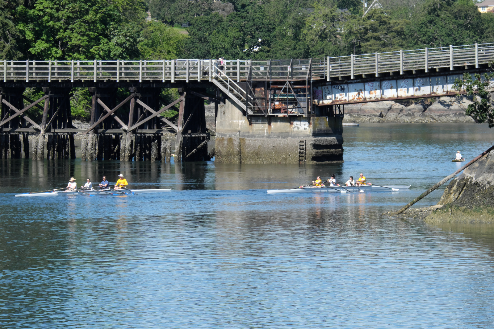Two quads headed under the Selkirk Trestle.
