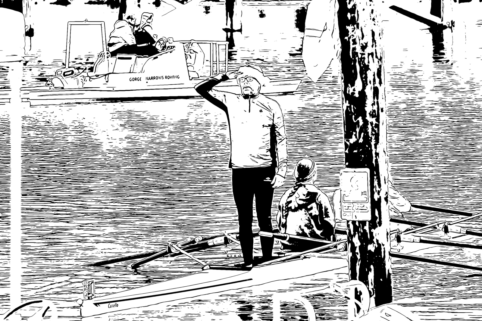 A rower standing in the boat at a quarts race.