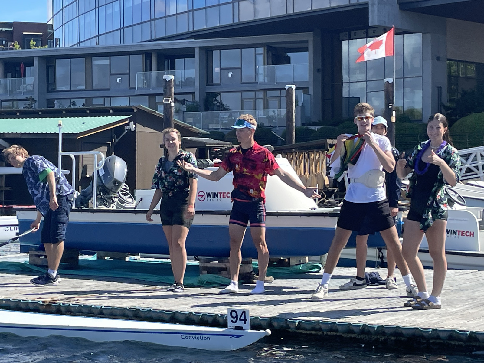 Juniors rowers having fun on the dock.