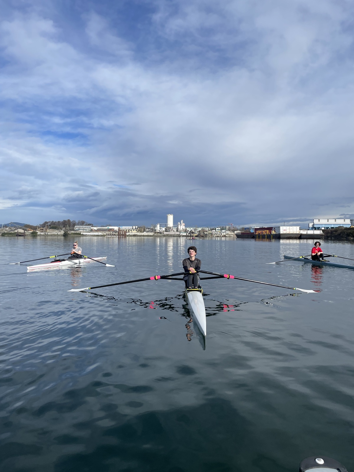 Three youth rowers in our Juniors program in singles.